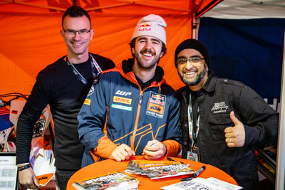 Iron City staff with a KTM factory rider at a launch event